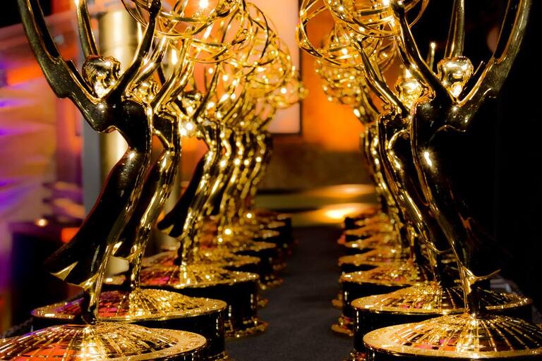 Photo of several Emmy award trophies